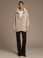 Women's Cotton Cardigan worn by model, oversized funnel collar, front view
