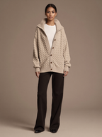 Women's Cotton Cardigan worn by model, oversized funnel collar, front view