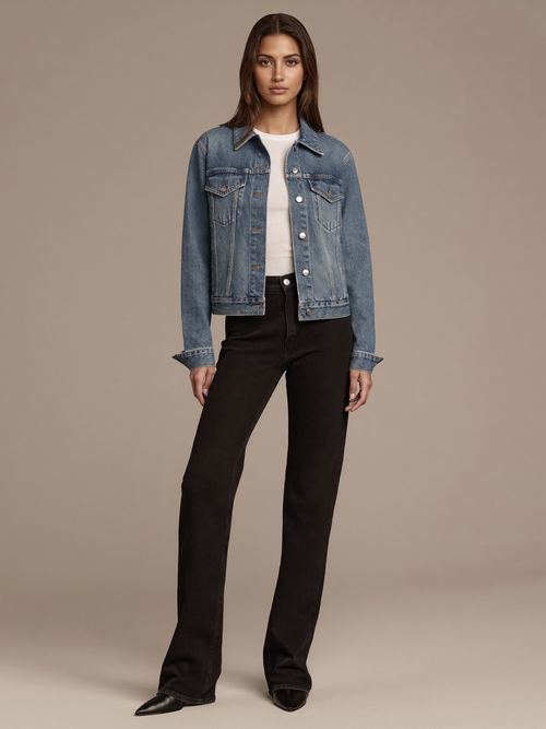 Women's Denim Jacket worn by model, classic trucker silhouette, front view